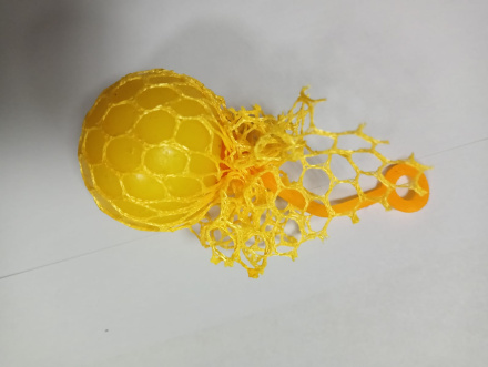 Игрушка-мялка антистресс желтый шарик, желтая сетка