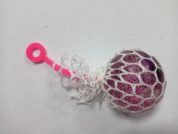 Игрушка-мялка антистресс белая сетка, прозрачный шарик с розовыми блестками и розовым хвостиком