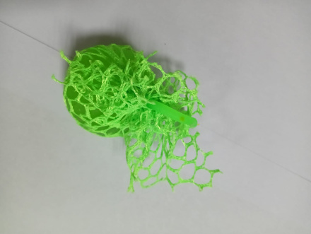 Игрушка-мялка антистресс зеленый шарик, зеленая сетка